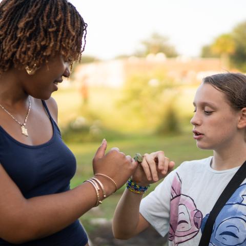 Savannah State students with tree frog